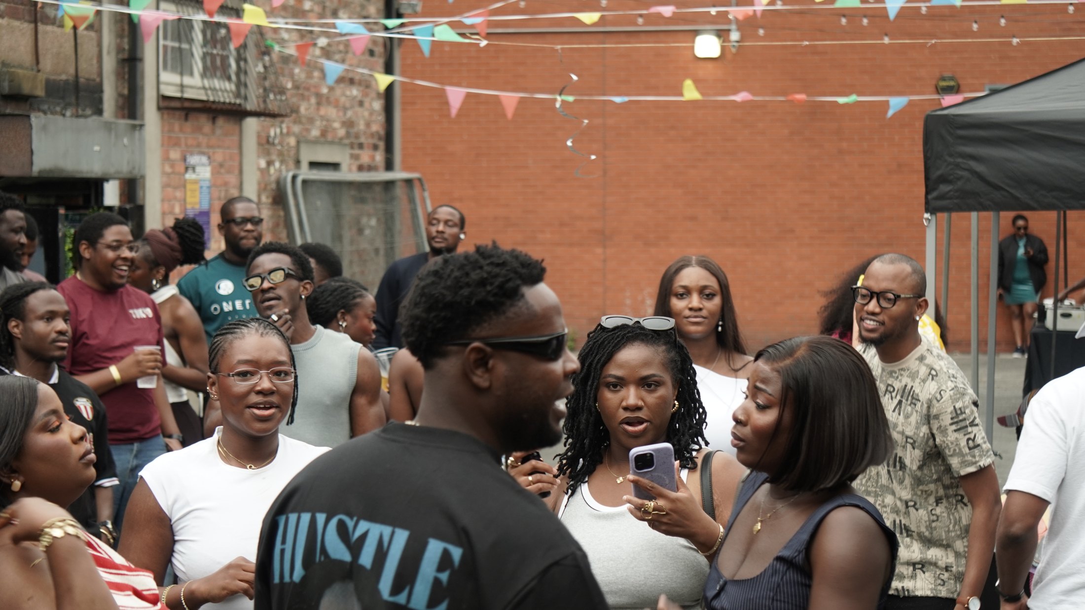 The community gathered in the courtyard