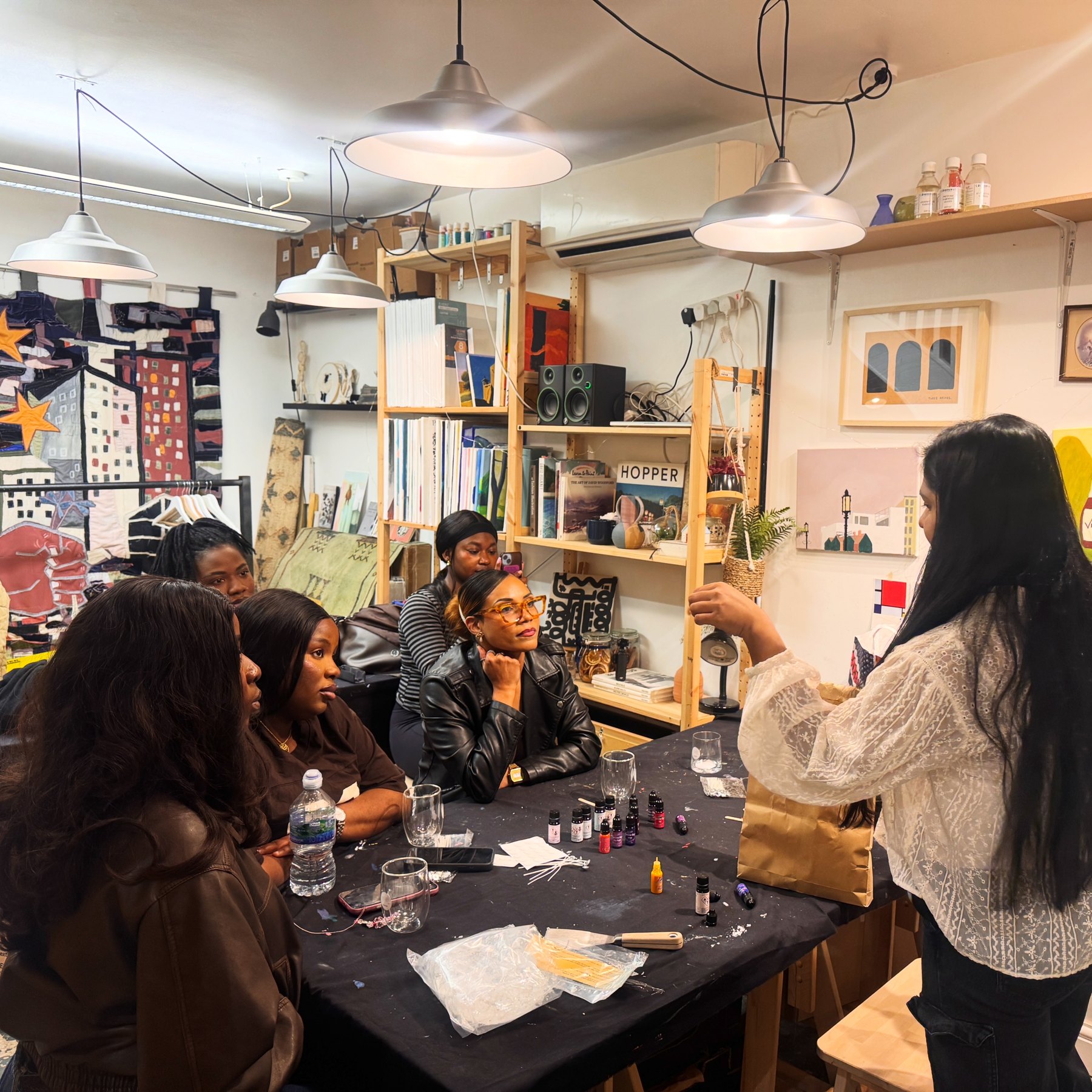 The candle-making workshop around a shared table