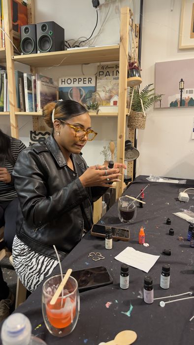 A guest making a candle