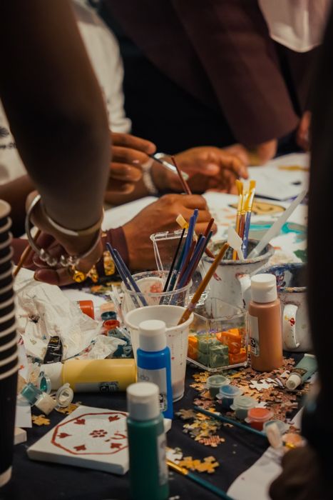 A table of brushes and paints