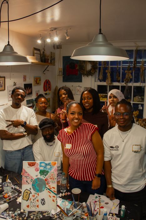 The community together after painting